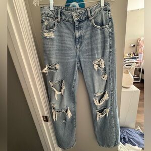 Garage blue low rise distressed slouchy jeans.